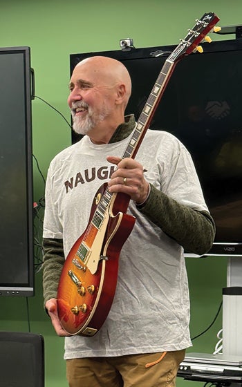 Dave Opie surprised by staff with Christmas gift